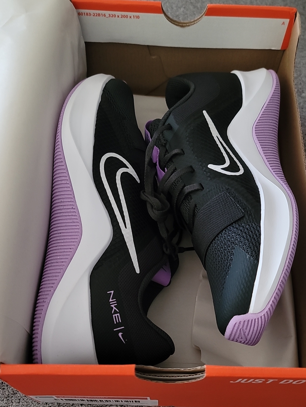 Nike Black Athletic Sneakers with Purple Accents